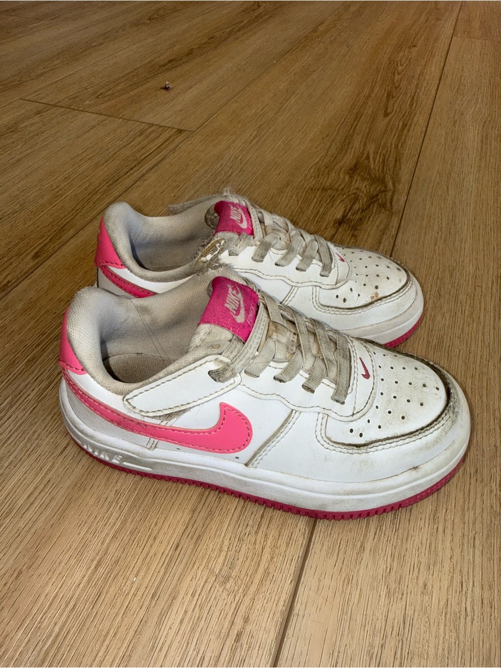 Nike Kids White Sneakers with Pink Swoosh